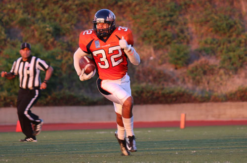 Sophomore Marquice O'Leary returns one of his six interceptions on the season during the Owls' opener against College of the Canyons. O'Leary recently signed with Prairie View A&M. Photo By: Brenda Fink