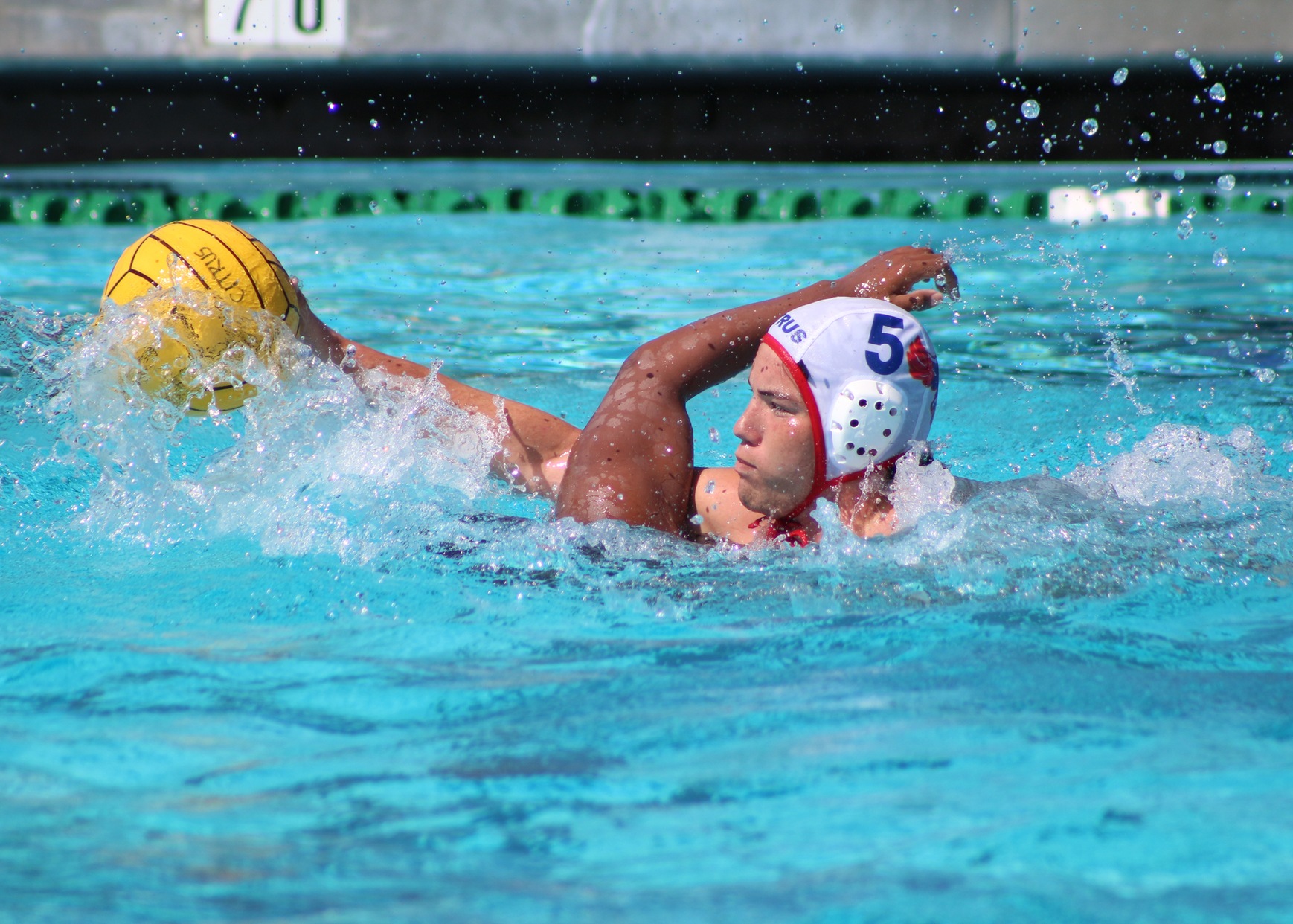 Gaige Chyrchel does battle with a Cypress defender on Sunday.