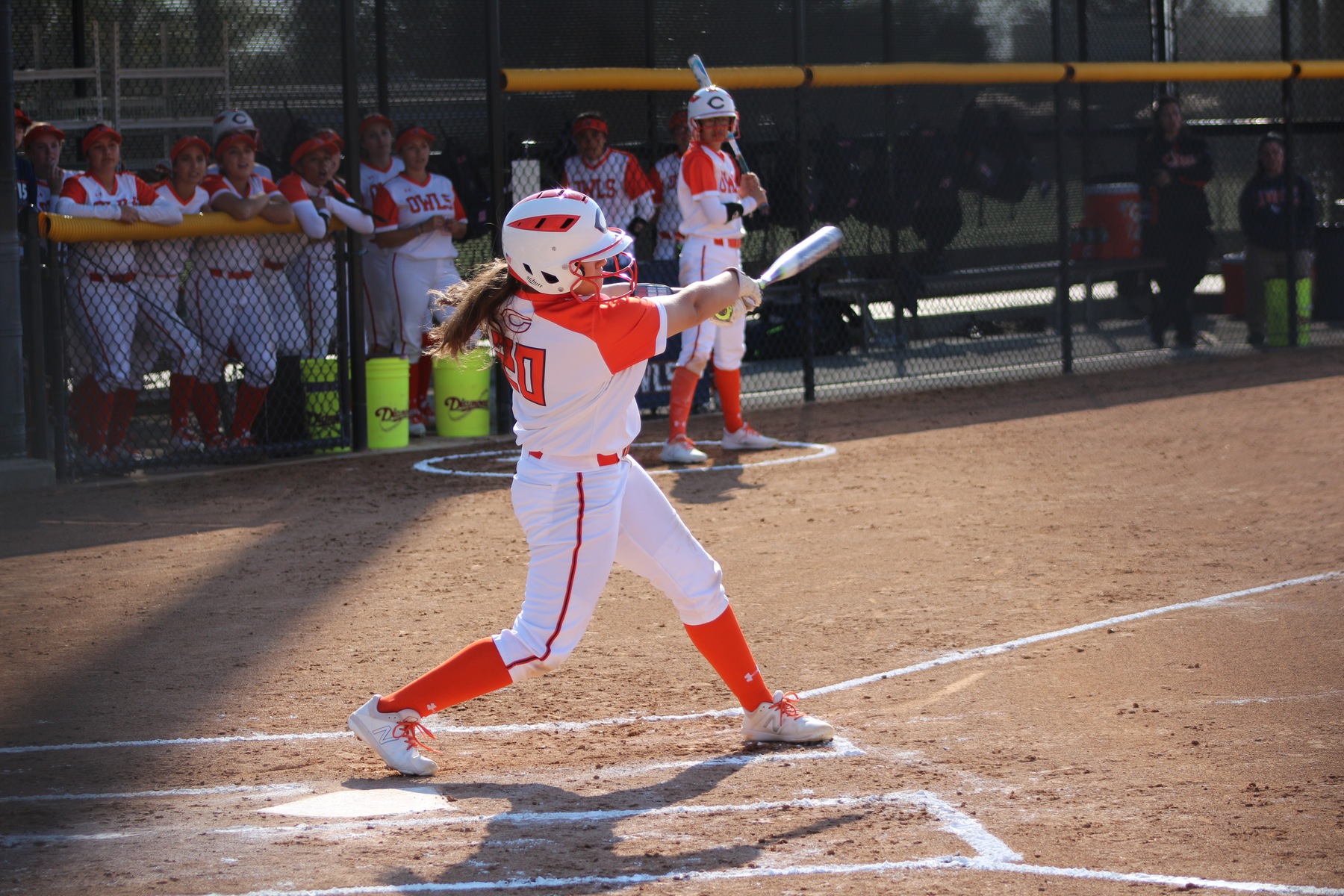 Giavanna Muenz connects with a pitch. Photo credit: Treyvon Watts-Hale