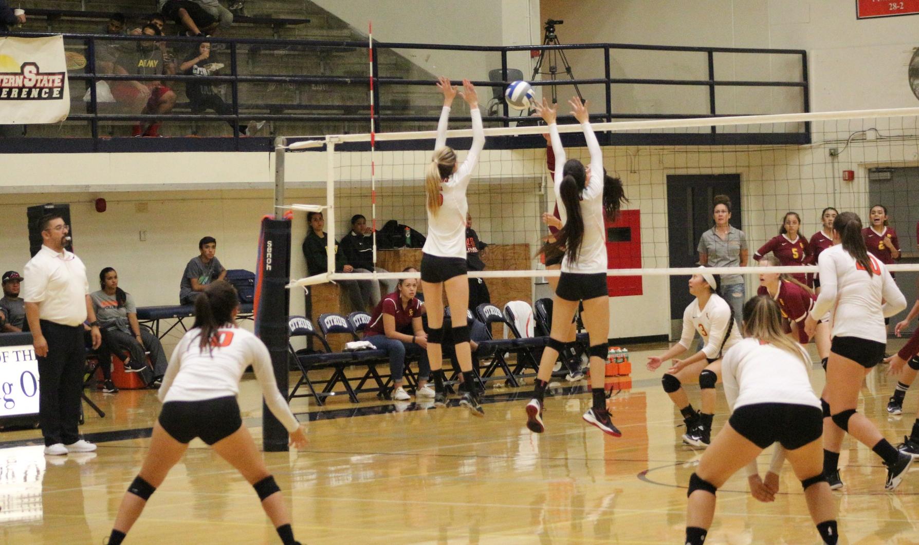 Iris Bernal and Leah Price protect the net for Citrus. Photo credit: Semaj Shepheard