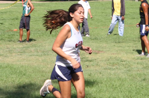 Sophomore Lovella Perea was the first Owl across the finish line at yesterday's WSC Championships. Photo By: Sam Ungeheier